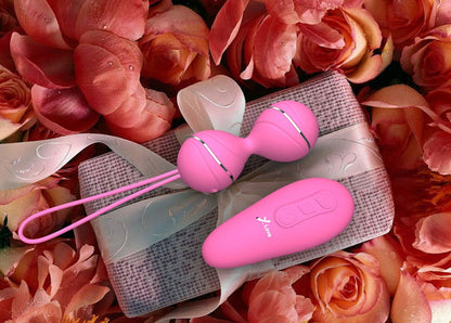 Light pink vibrating balls and remote with roses