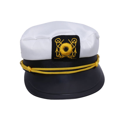 White sailor cap with black visor and gold trim