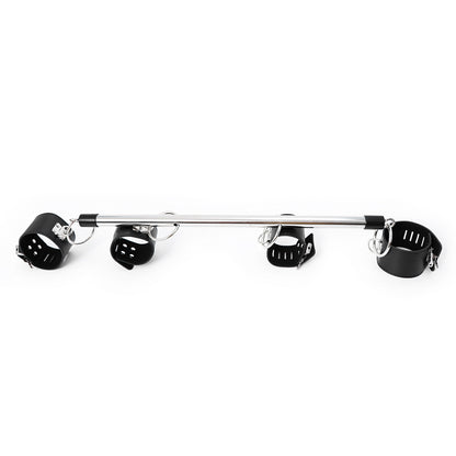 Metal bar with four black cuffs displayed flat