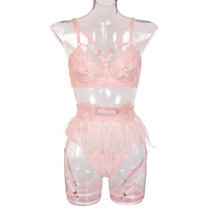 Pink embroidered lingerie displayed on mannequin