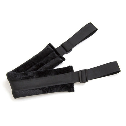 Black strap with padding and buckle details