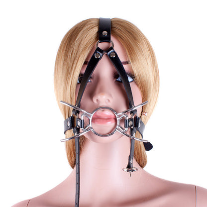 Black head harness with silver-tone ring gag shown on a display mannequin