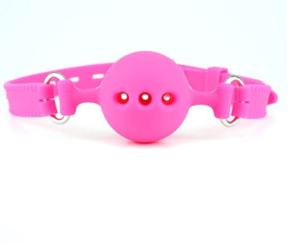 Pink perforated ball gag with adjustable strap
