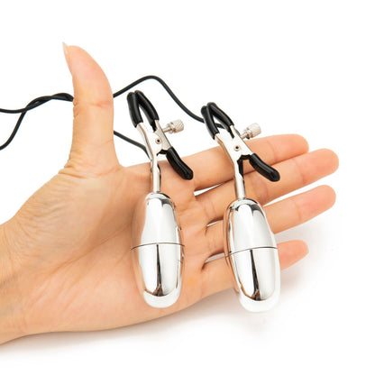 Silver-tone vibrating clamps held for scale