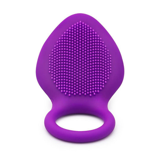 Purple vibrating ring with a broad pad covered in raised texture
