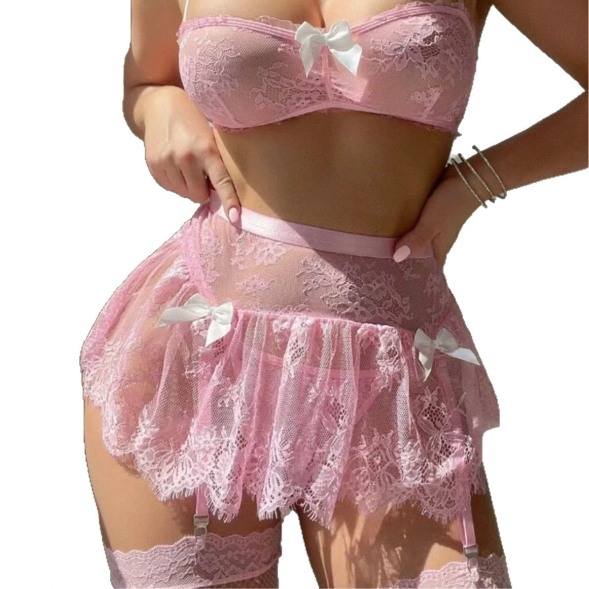 Close-up of pink lace skirt and bow details