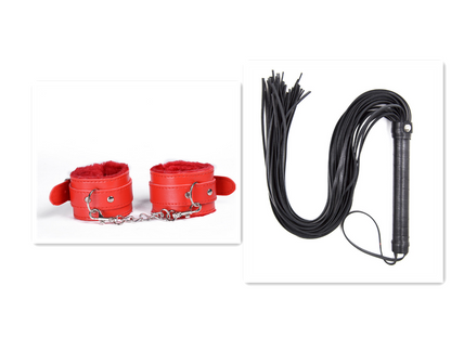 Red cuffs beside black flogger