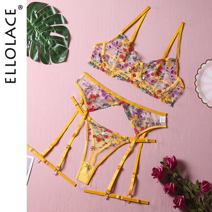 Yellow floral embroidered lingerie set displayed flat