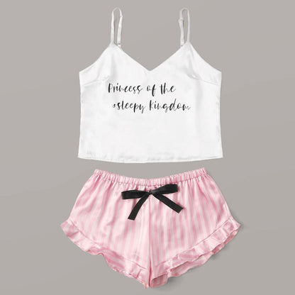 White slogan camisole with pink striped shorts
