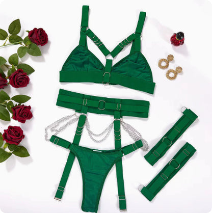 Green harness lingerie components displayed flat