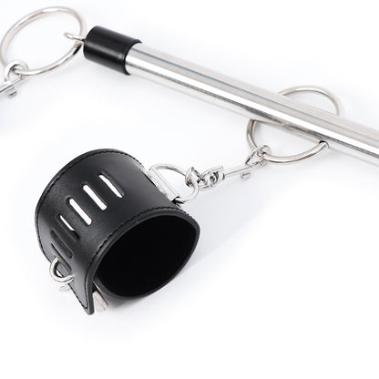 Close-up of black cuff connected to metal bar