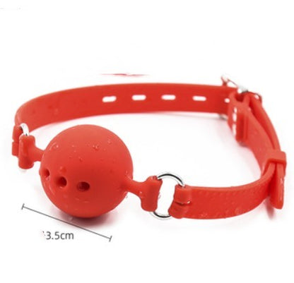 Red ball gag with adjustable strap and size annotation
