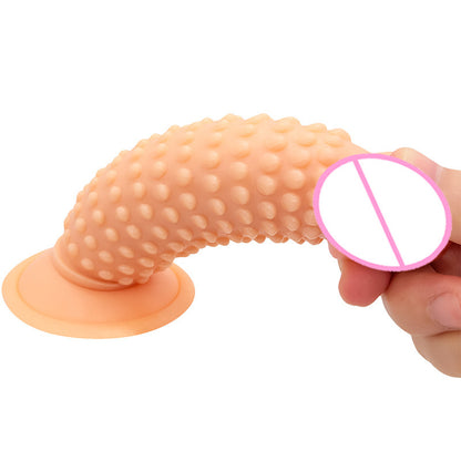 Peach textured toy bent to show flexibility