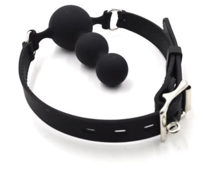 Three-ball gag with black adjustable strap