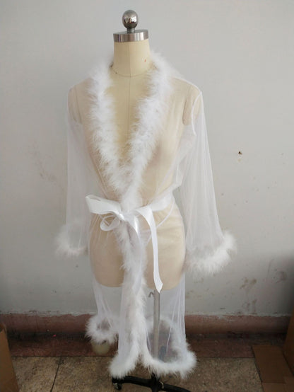 White sheer robe displayed on a mannequin