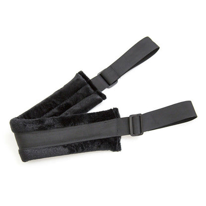 Black padded adjustable strap folded flat