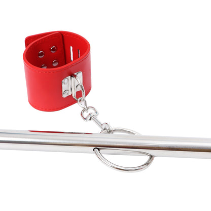 Red cuff clipped to metal bar